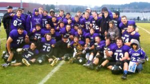The Shelby Tigers celebrate with their second straight regional title trophy. Photo/Mark Lewis