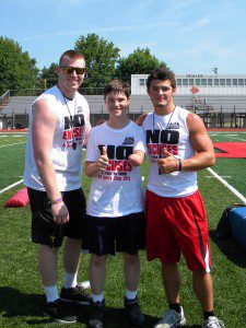 Karson Kriger attended Nubabilty camp in Delaney, Ill. and is pictured with coaches Eddie Delany (L) and Kevin Crafton. 