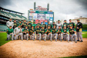 Muskegon Catholic's baseball team stands as a team at home plate after its win over Grand Rapids Catholic. Photo/Tim Reilly 