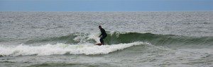 Jeremy Anderson catches a wave. Photo/Jason Goorman