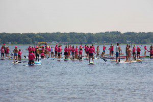 Participants paddle out to kick off the 5k race. Photo/Jason Goorman