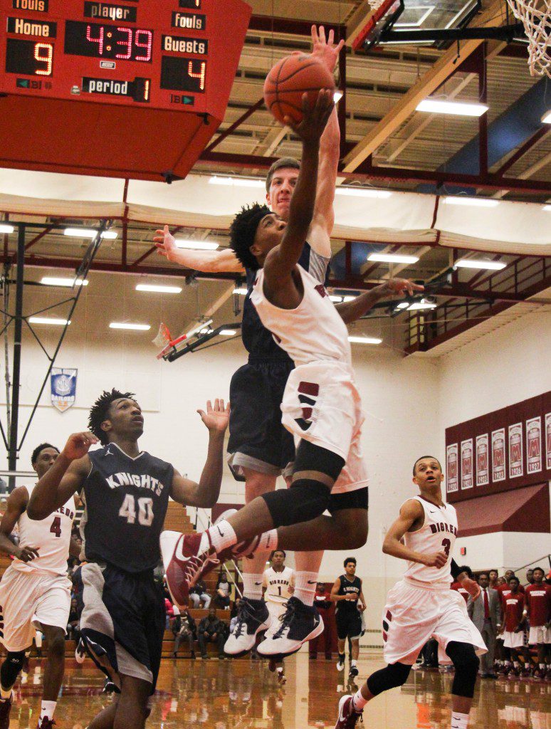Muskegon's Michael Littlejohn Jr. glides in for the layup for his 11th point in the first quarter. Photo/Jason Goorman