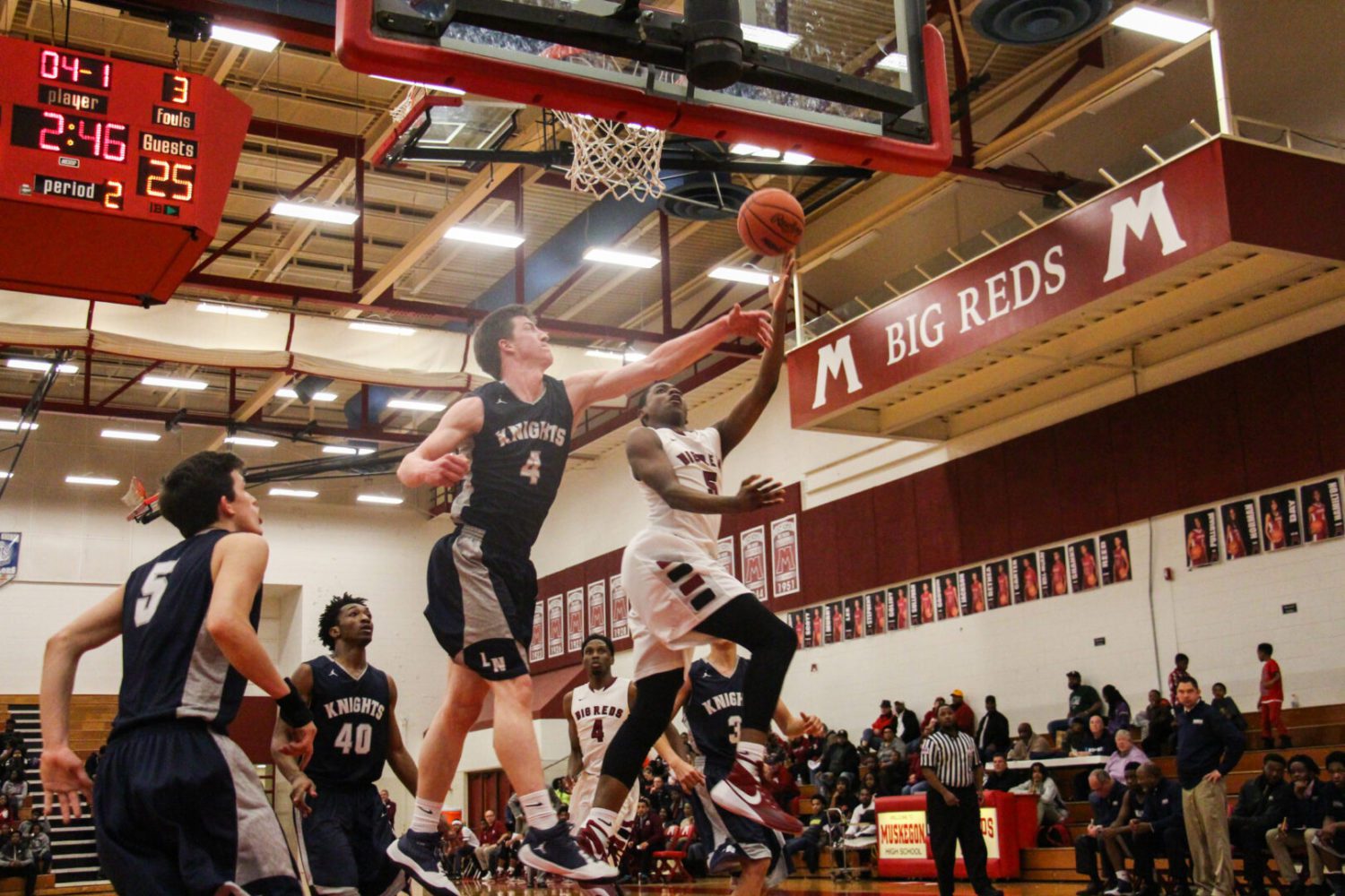 Big Red seniors shine in last home game, a 68-59 victory over Kalamazoo Loy Norrix