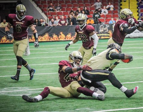 Korey Ringer makes a tackle for West Michigan. Photo/Joe Lane