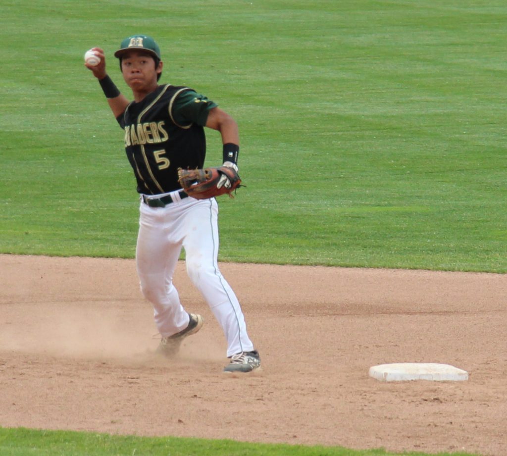 An Pham makes the play at shortstop for MCC. Photo/Dave Hart