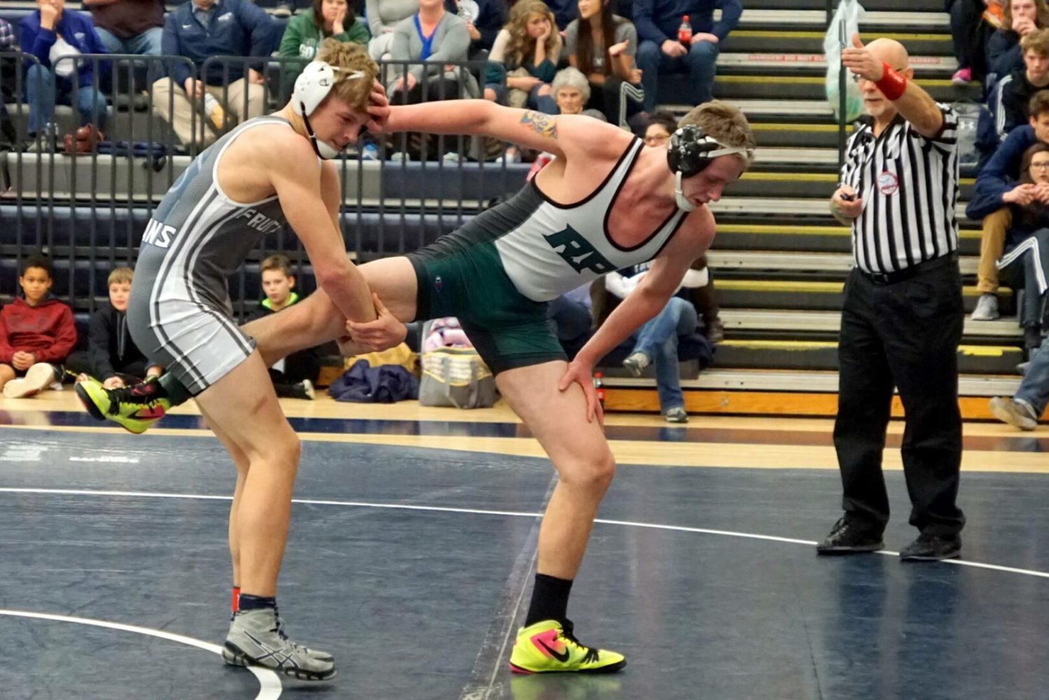 Reeths-Puffer wrestlers beat back challenge from rising Fruitport squad