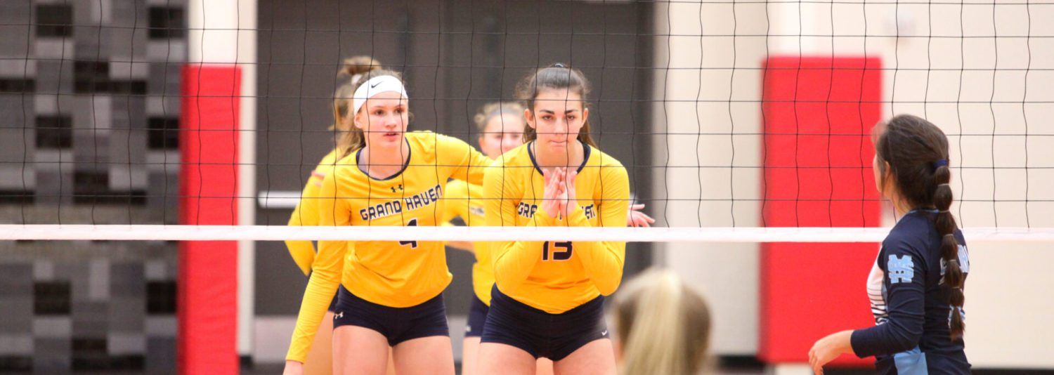 Grand Haven downs Mona Shores in three sets, wins 11th straight district title