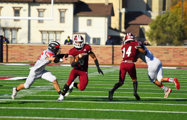 Muskegon Big Reds roll on offense in their 34-12 district semifinal