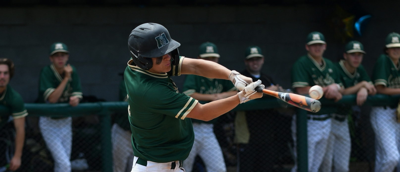 Muskegon Catholic baseball squad outscores two opponents 27-0 to win its ninth straight district championship