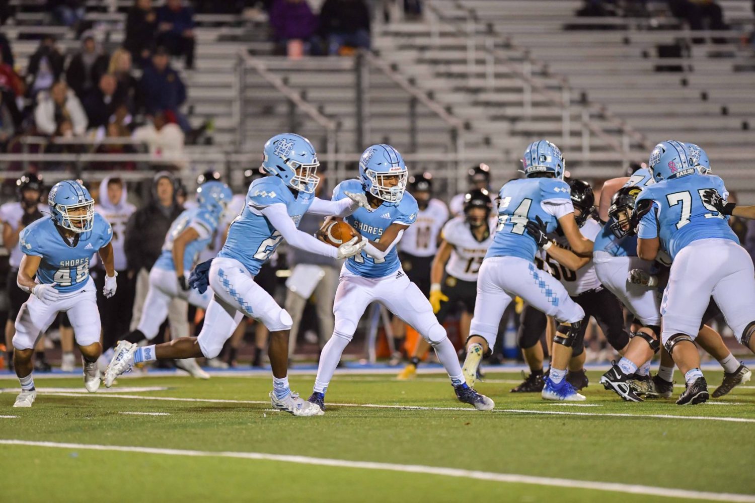 First-half dominance carries Mona Shores to opening-round victory, 48-20