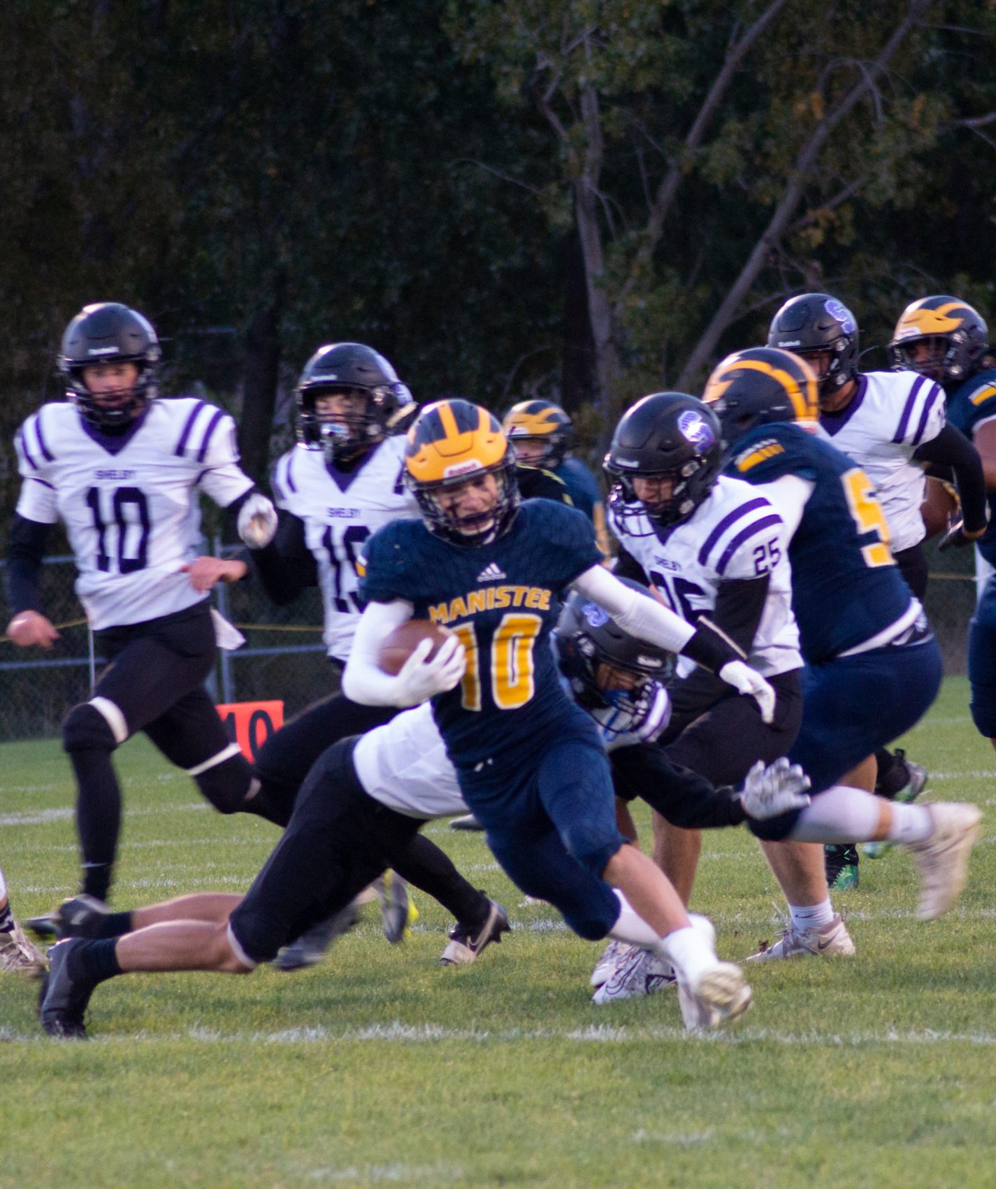 Manistee cruises past Shelby, 54-7