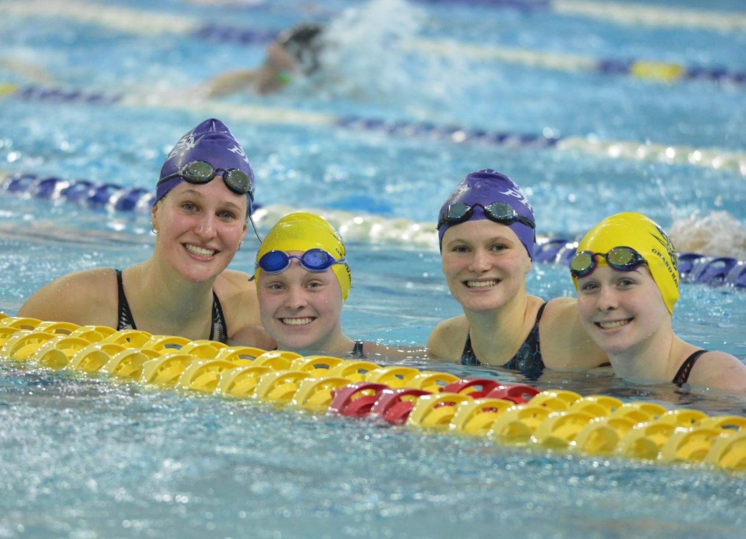 Grand Haven finishes fourth in Division 1 state swimming meet; relay team captures state title