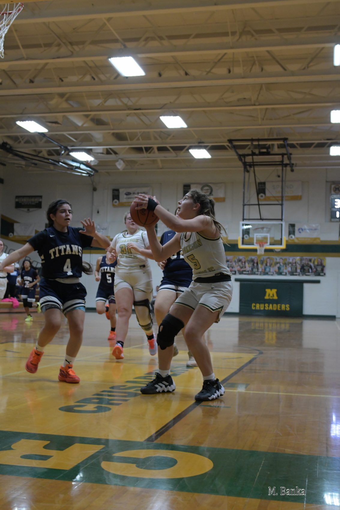 Carrie Ladd pours in 31 points for Crusaders in narrow loss to Grand River Prep