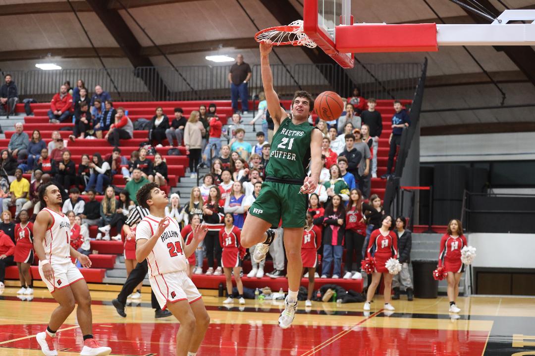 Reeths-Puffer runs over Holland in boys basketball action
