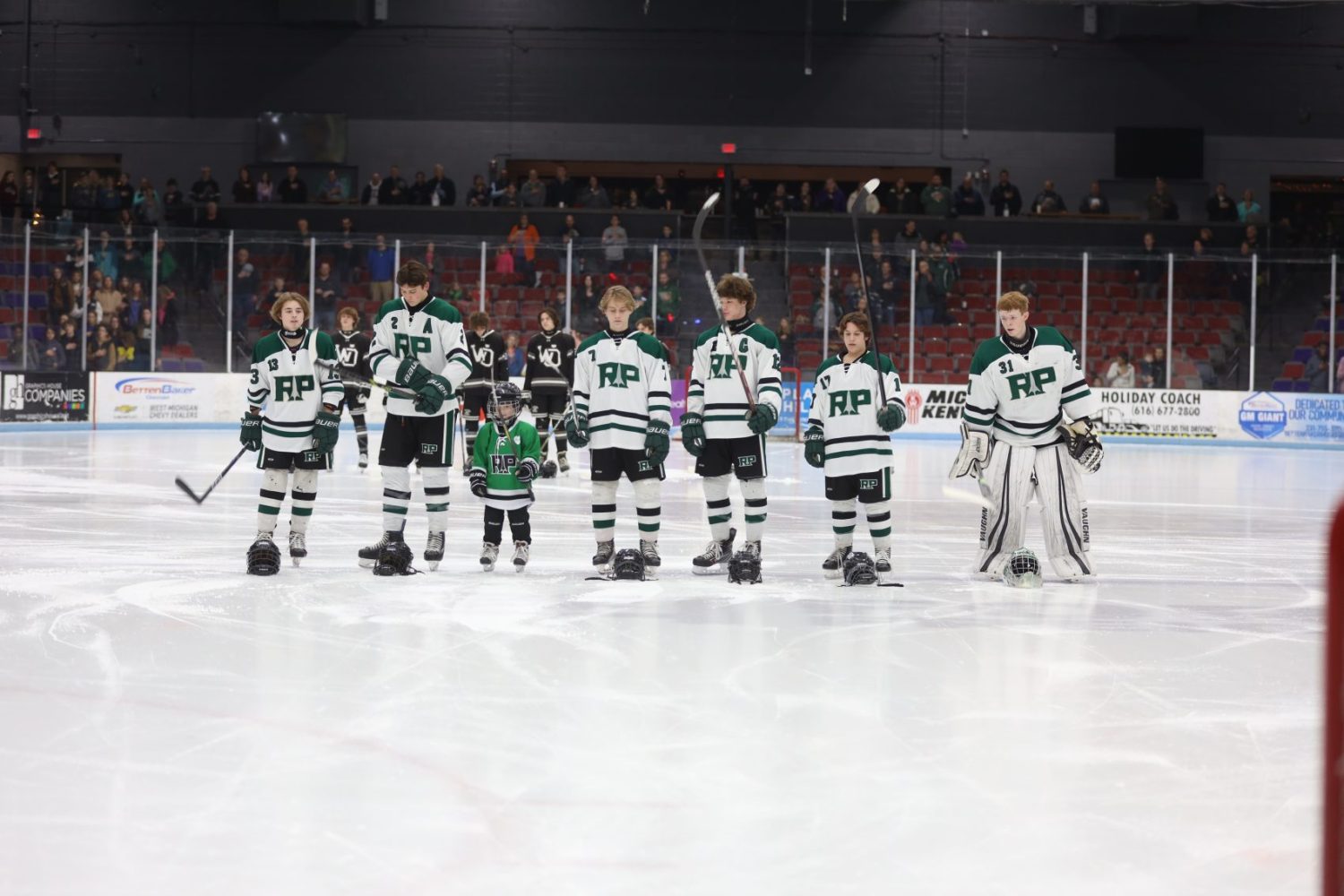 Reeths-Puffer honors memory of Jennifer Langlois in 5-1 victory over West Ottawa in prep hockey action