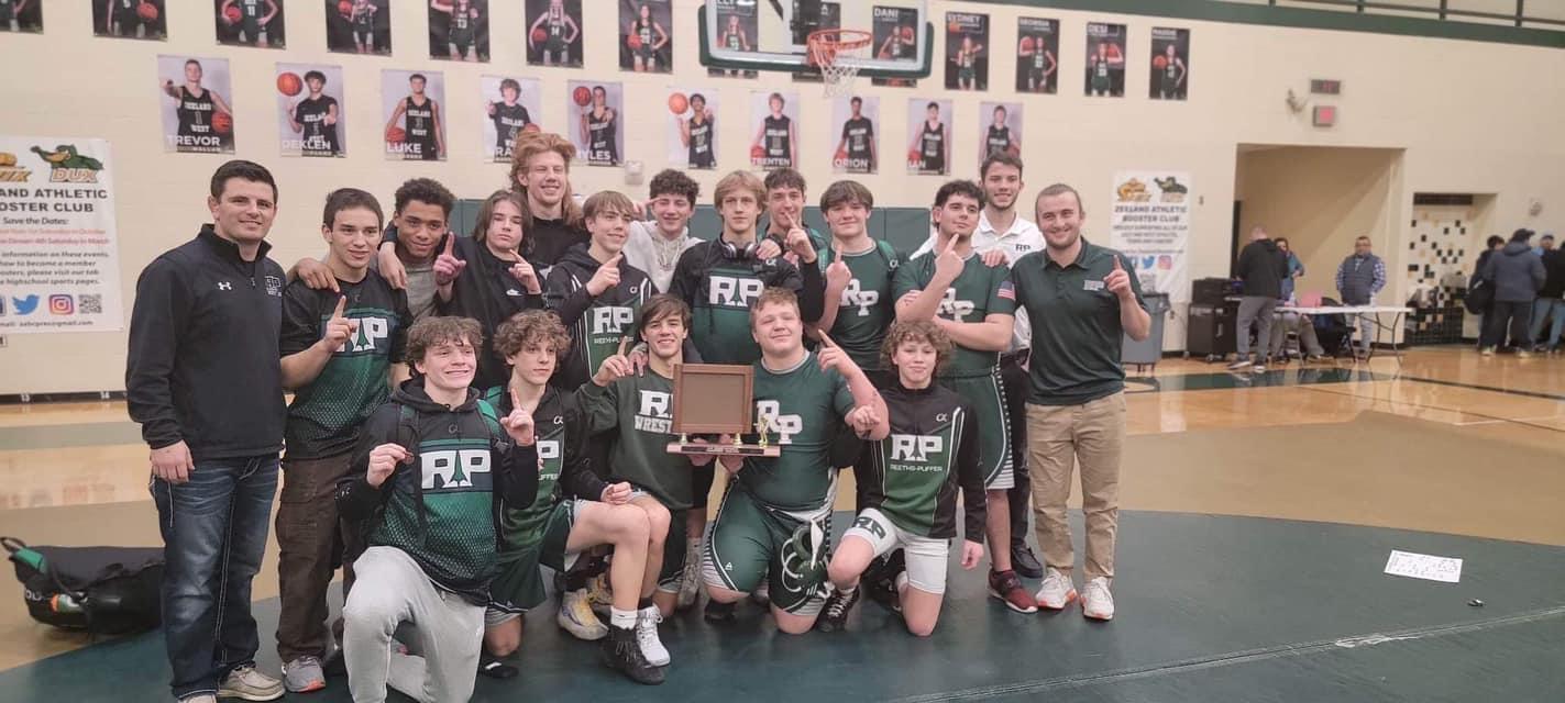 Reeths-Puffer captures wrestling title in OK-Green; five Rockets win titles