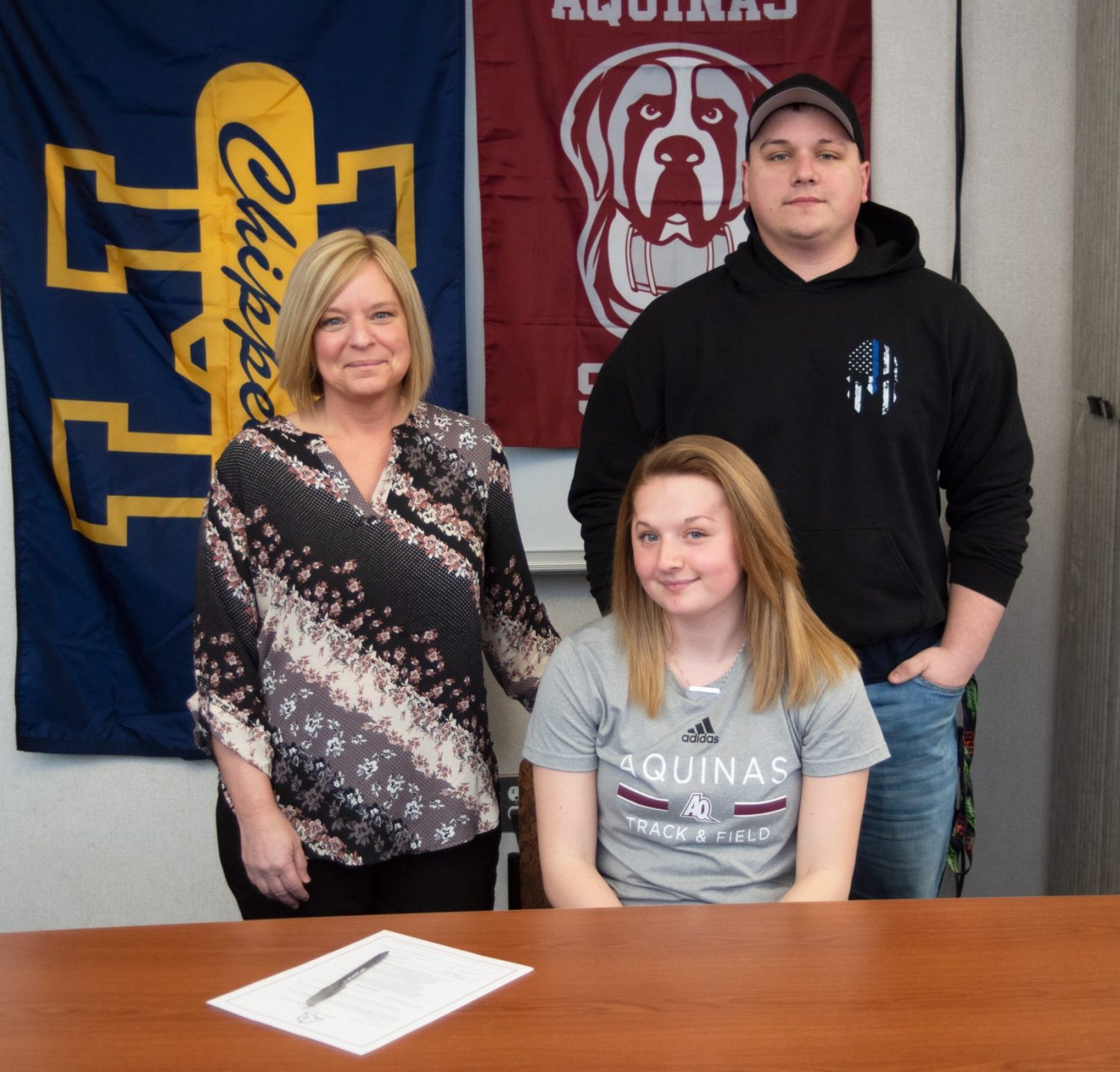 Ashtyn Janis heading to Aquinas College to continue track career