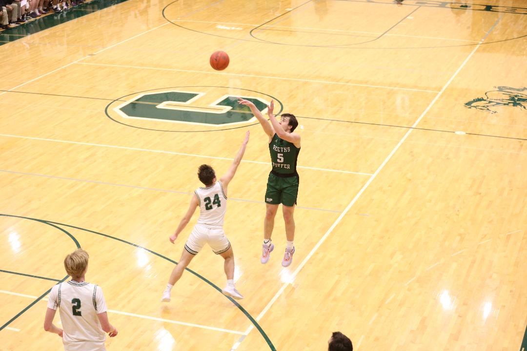Reeths-Puffer wins OT thriller over Coopersville; Ambrose, Whitaker combine for 48 points