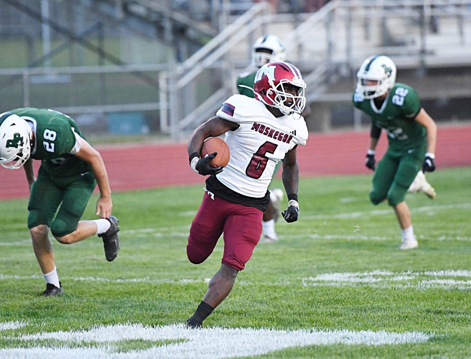 Improving Muskegon Big Reds take down cross-town rival Reeths-Puffer, 28-13