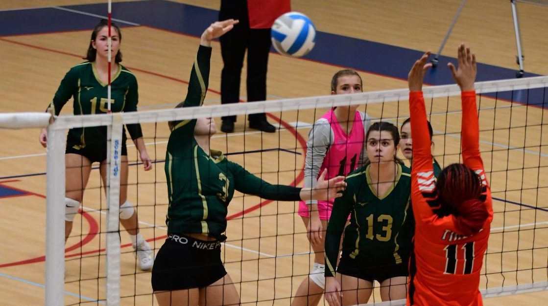 Muskegon Catholic Central tops Muskegon Heights to advance in Division 4 district volleyball