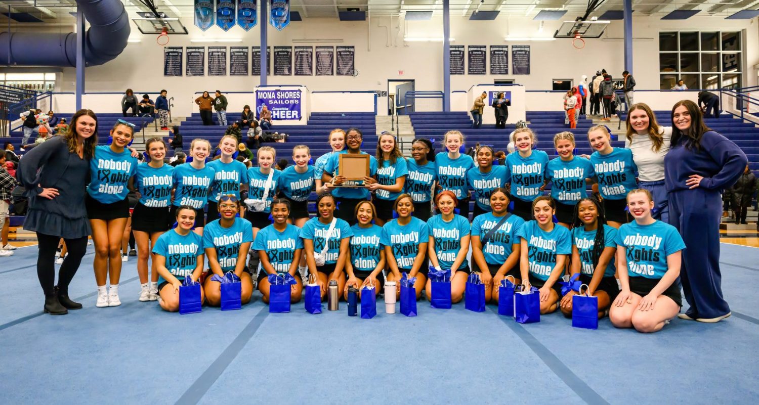 Mona Shores competitive cheer takes home OK-Green title
