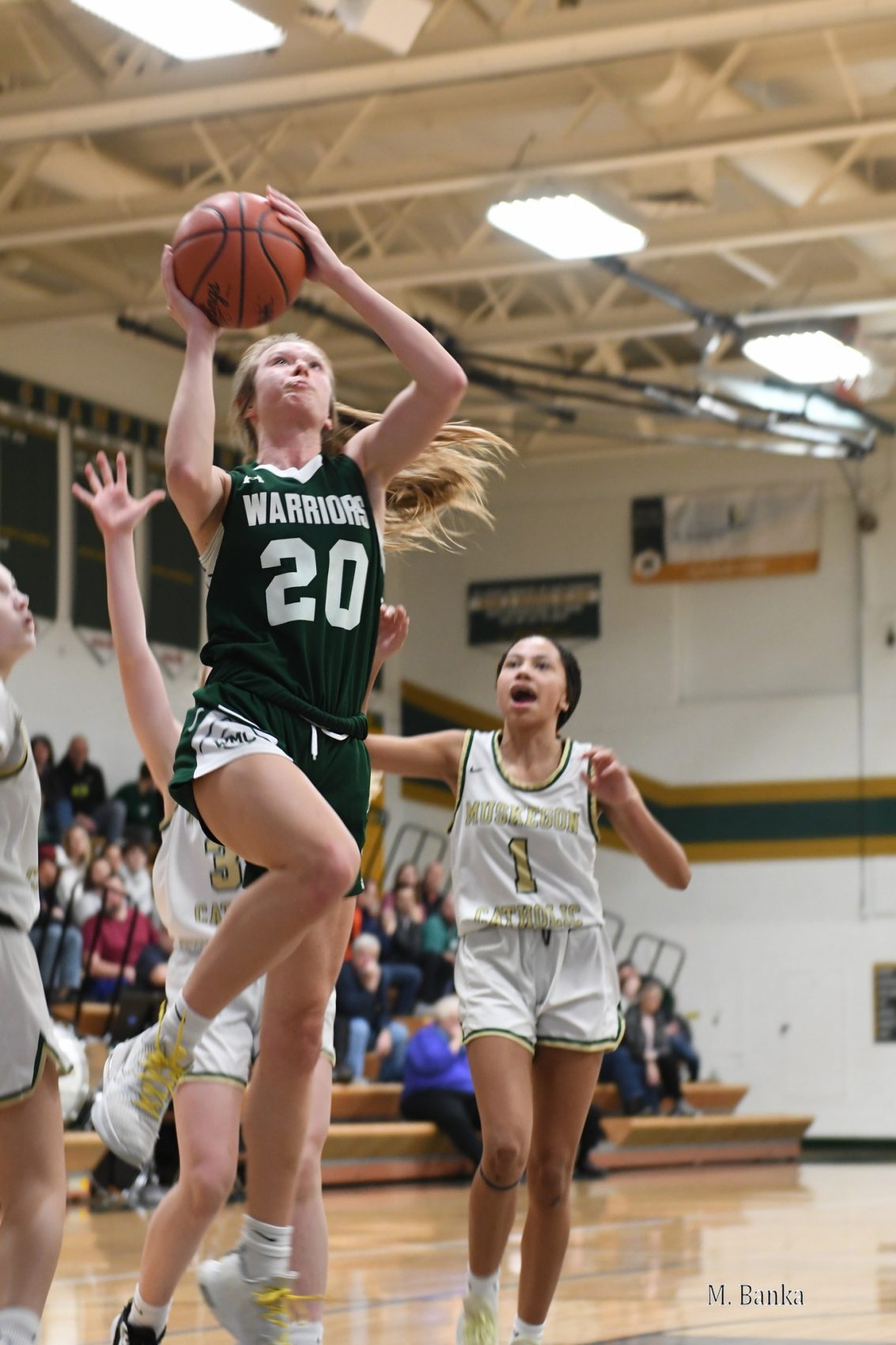 Folkema’s strong outing leads Western Michigan Christian girls to victory over rival Muskegon Catholic